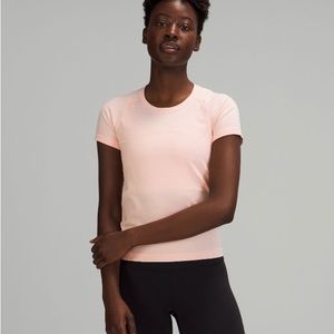 Lululemon dew pink swiftly tech, race length, size 10.